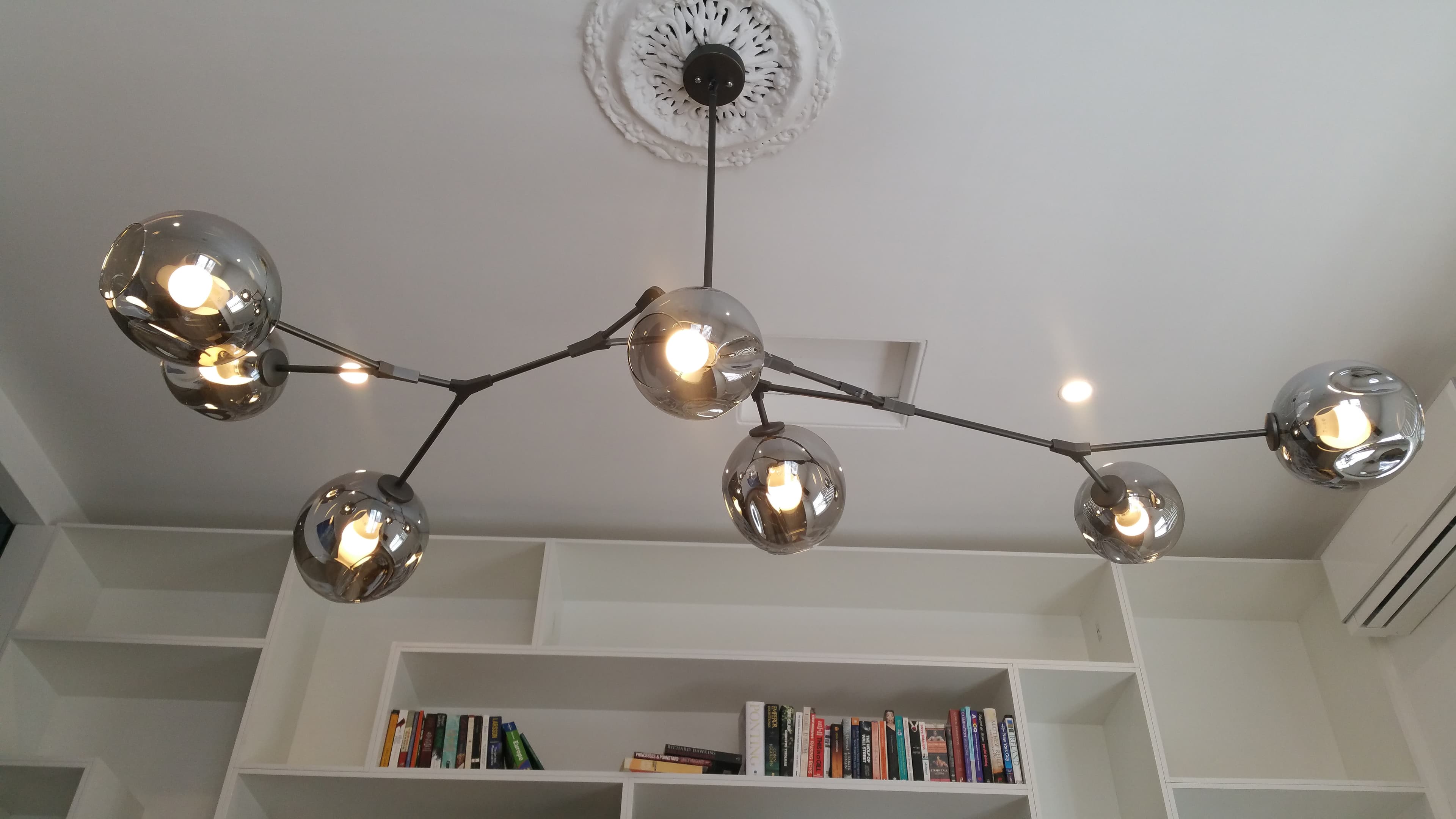 Specialty pendant light installed on a 3.6-metre ceiling